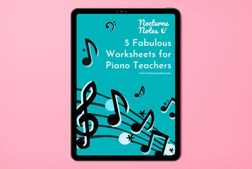 Top down view of a desk with a white ipad displaying the e-book of "5 fabulous worksheets for piano teachers" from nocturne notes.